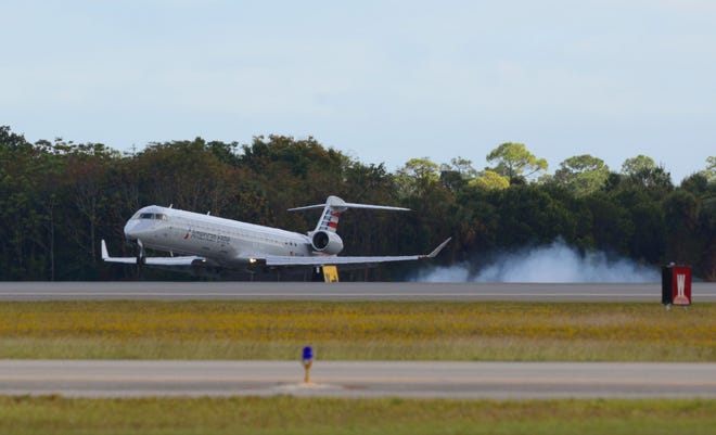 US Airways flight from Charlotte touches down at Daytona Beach International Airport recently, where $65 million in capital improvements have been put in place in anticipation of more traffic.