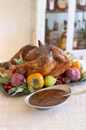 This Oct. 27 photo shows barbecue spiced turkey in Concord. Looking for sides that play up everything going on with this bird? Consider a cornbread-based stuffing, roasted sweet potatoes and roasted squash drizzled with cumin-spiked butter.