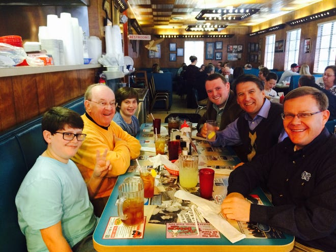 Gov. Pat McCrory stopped in Shelby on Sunday to have lunch at Red Bridges Barbecue Lodge with Rep. Tim Moore, the Republican House members' choice for speaker. Seated on the left are Moore's son, Wilson, his dad, Rick, and other son, McRae. On the other side of the table is Moore, McCrory and Moore's law partner Justin Brackett. (Photo courtesy of Tim Moore)