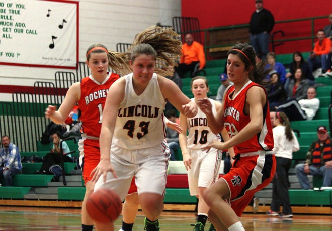 Lincoln's Megan Jackson drives to the hoop during a regular season contest against Rochester last season. Photo by Bill Welt/The Courier