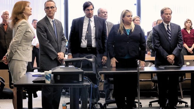 John Goodman and his attorneys stand as he was pronounced guilty Tuesday, October 28, 2014 of DUI manslaughter with failure to render aid in the death of Scott Wilson. From left are Tama Kudman, Scott Richardson, Goodman, Elizabeth Parker and Douglas Duncan. (Lannis Waters / The Palm Beach Post)