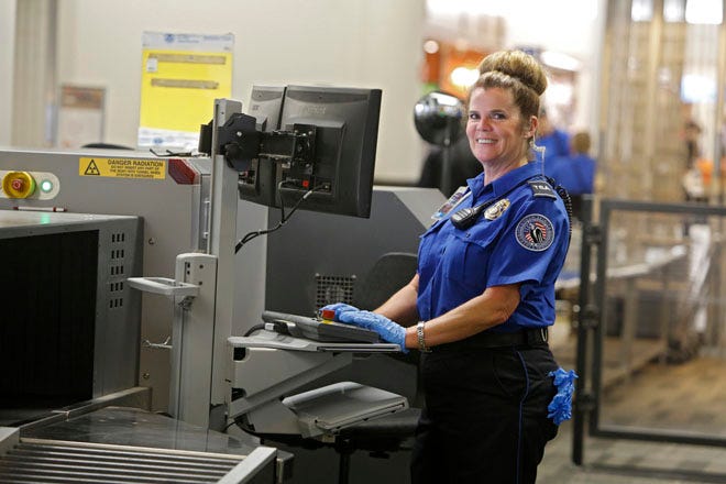 Security officer Terri Donelli on the job at Port Columbus
