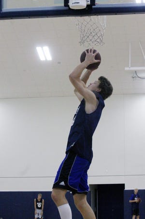 Hillsdale Academy's Noah Kalthoff pulls down a rebound during a recent practice session at Hillsdale College. For previews of the Colts and all over Hillsdale County prep basketball teams, check out Full Court Press, coming Friday, Dec. 12 in the Hillsdale Daily News. DAVID VANTRESS PHOTO