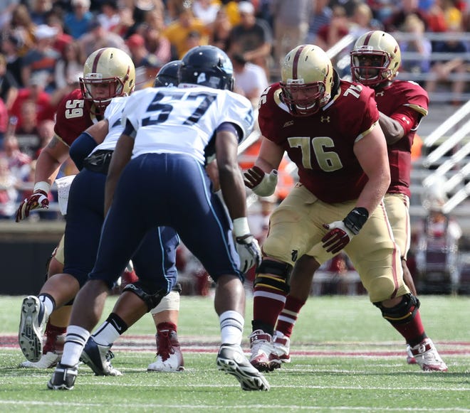 Guard Bobby Vardaro (76) and center Andy Gallik (59) have been the two constants over the last two years on an offensive line that's been at the core of Boston College's resurgence under coach Steve Addazio.