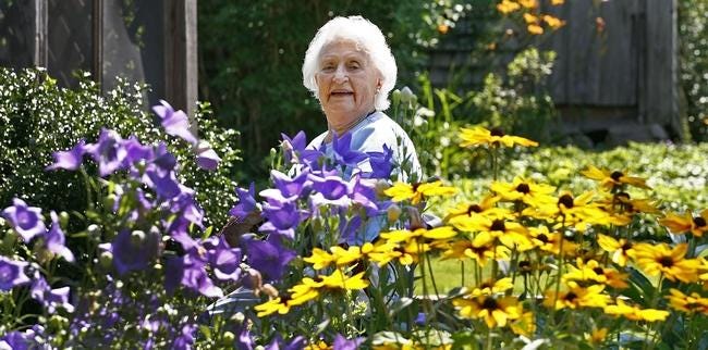 Mary Eliot in her Marshfield garden in 2013.