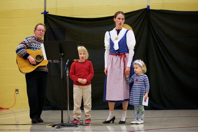 The Klaus family singing songs from Finland and Switzerland at the Burbank School Muliticultural Night. Courtesy Photo / Glenn Wong