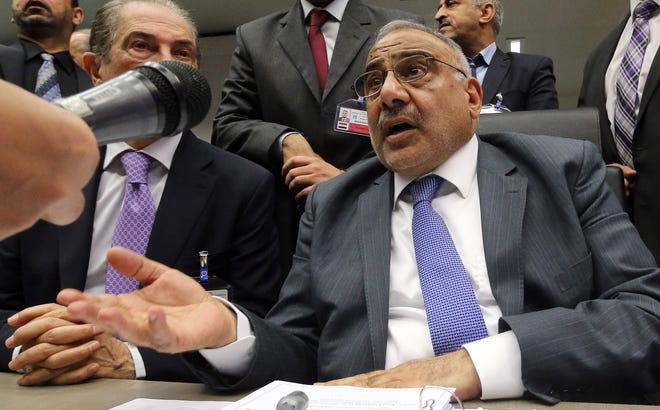 Iraq's Minister of Oil Adil Abd Al-Mahdi speaks to journalists prior to the start of a meeting of the Organization of the Petroleum Exporting Countries, OPEC, at their headquarters in Vienna, Austria on Thursday.