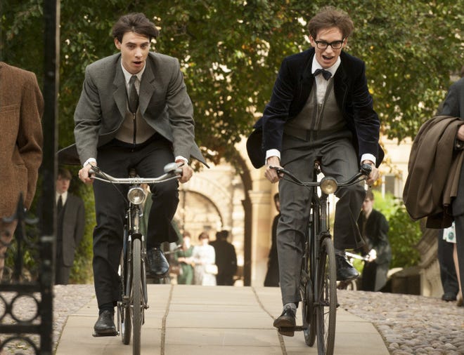 Harry Lloyd, left, stars as Brian and Eddie Redmayne stars as Stephen Hawking in "The Theory of Everything."