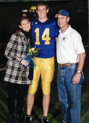 Photo taken on the field before the game on Sean Mannion's senior night at Foothill High in Pleasanton in 2009, with his mom, Inga, and dad, John. (Mannion family)