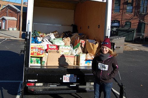 Erin Lynch, director of the Franklin Food Pantry, stands in front of the truck carrying food donations from last year's Turkey Trot 5K. The pantry collected more than 2,000 pounds.



Contributed photo.