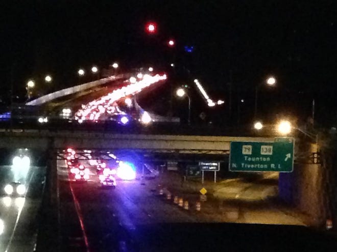 Traffic is backed up along Interstate 195 westbound seen from Fall River as police investigate a fatal hit-and-run near the Braga Bridge in Somerset.