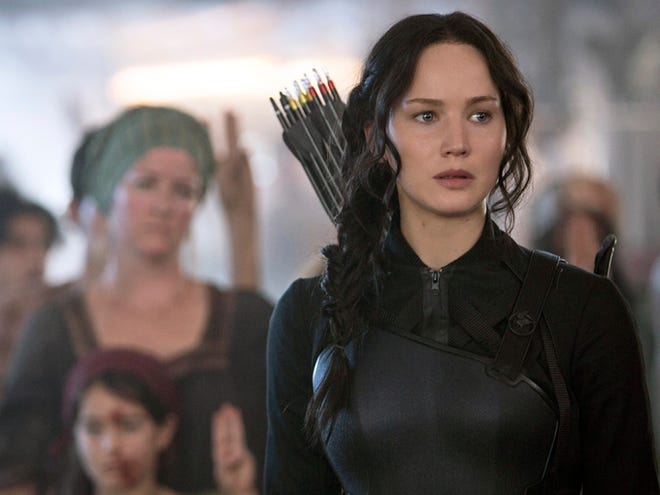 Jennifer Lawrence portrays Katniss Everdeen in a scene from "The Hunger Games: Mockingjay Part 1."