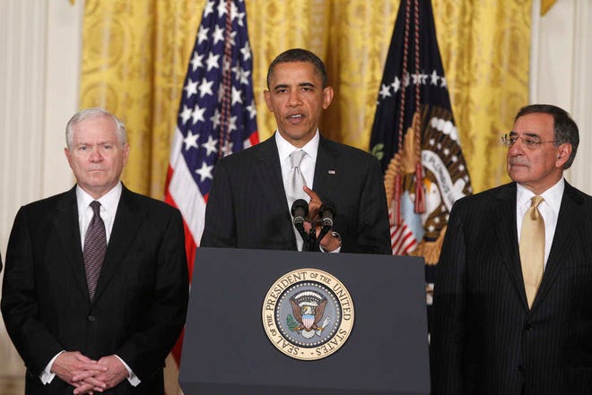 FILE - This April 28, 2011, file photo shows President Barack Obama with then outgoing Defense Secretary Robert Gates, left, and then Defense Secretary-nominee Leon Panetta, in the East Room of the White House in Washington. The friction between President Barack Obama and the Pentagon has been particularly pronounced during his six years in office, and seems to be affecting his ability to find a replacement for Defense Secretary Chuck Hagel. Previous Pentagon chiefs have criticized Obama's efforts to micromanage the Pentagon and centralize decision-making in the White House. (AP Photo/Charles Dharapak, File)