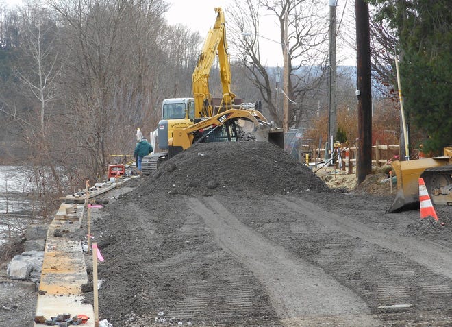 Work continued on the embankment off of East German Street Extension on Tuesday to repair the crumbling infrastructure. The project is near completion, according to Herkimer Town Supervisor Dominic Frank. Telegram photo/Stephanie Sorrell-White