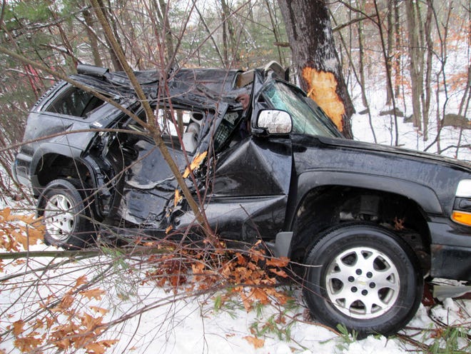 A Chevy Tahoe was badly damaged and a Barrington woman faces a DWI charge after a crash in Rochester Sunday afternoon.