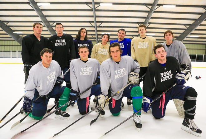 The seniors on the York High School boys hockey team are motivated to return to the Western Maine Class B tournament after missing the playoffs last year. Pictured, front row, from left, Adam Jannetti, Jimmy Orso, Derek Neal and Nick Walsh. Back row, from left, Brendan Carney, Conall Anderson, Matt Abruzzese, Dillon Goslin, Matt Wacker, Jack Engholm and Eric Lindbom. Matt Parker/Seacoastonline
