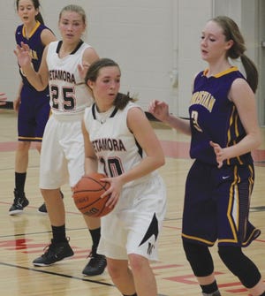 Metamora’s Heather DeLuca makes a stand against the Peoria Christian defense earlier this season.