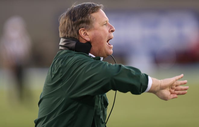Colorado State head coach Jim McElwain directs his team against Air Force in the fourth quarter of Air Force's 27-24 victory in an NCAA college football game at Air Force Academy, Colo., on Friday, Nov. 28, 2014. (AP Photo/David Zalubowski)