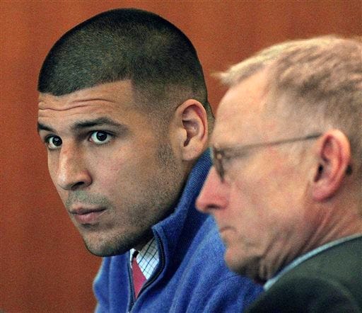 FILE - In this Oct. 1, 2014 file photo, former New England Patriots football player Aaron Hernandez, left, and his lawyer Charles Rankin attended an evidentiary hearing at Fall River Superior Court in Fall River, Mass., where he faces charges in the 2013 shooting death of Odin Lloyd. Lawyers for Hernandez are due in court Tuesday, Nov. 25, 2014, on issues in a separate case, where Hernandez is charged in the 2012 fatal shootings of two men after a chance encounter in a Boston nightclub. 

AP Photo/The Boston Globe, Wendy Maeda, Pool, File