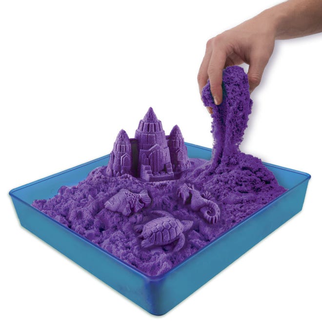 This is an undated, contributed image of a Wacky-Tivities' Kinetic Sand set. SPIN MASTER LIMITED/