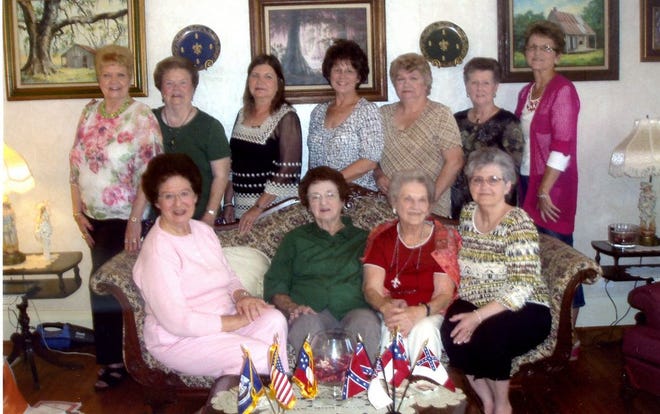 Shown during the meeting are, from left, standing, Barbara Rushing, Carolyn Keller, Kathy Fontenot, Patsy Stafford, Carole Rachal, Lorraine Gautreau, Ruth Hanson; and sitting, Shirley Bourque and Brenda Brignac.