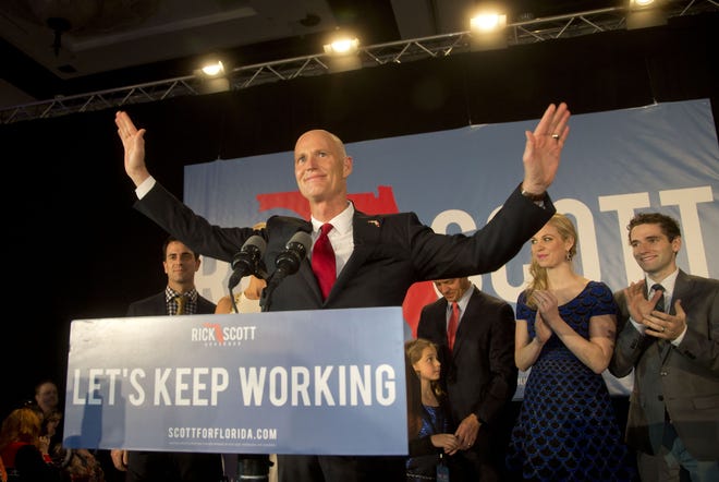 Gov. Rick Scott makes his victory speech after defeating Democratic challenger, former Republican, Charlie Crist, in Bonita Springs on Tuesday, Nov. 4, 2014. A lawsuit contends Scott used a private email account for state business.