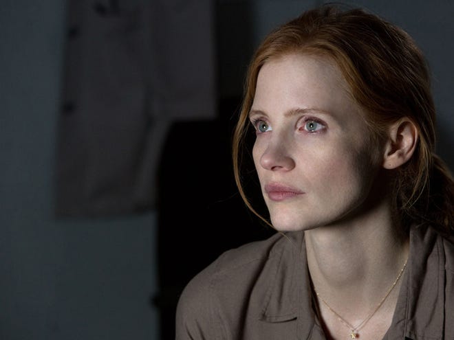 This photo released by Paramount Pictures shows Jessica Chastain in a scene from the film, '"Interstellar," from Paramount Pictures and Warner Brothers Pictures, in association with Legendary Pictures. The American Film Institute announced on Monday, Dec. 8, 2014, its top 10 films of the year, including "Interstellar."