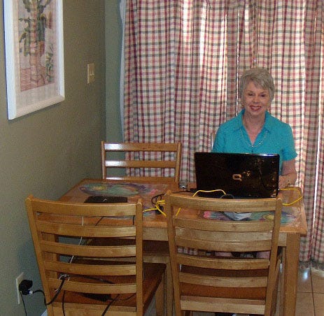 Author Gail Pallotta works in her little corner of the world last October while she was in Destin.