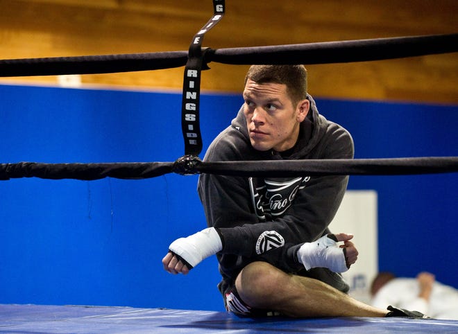 Stockton's Nate Diaz watches his brother, Nick Diaz, working out at Gracie Sports Academy in Lodi. Nate Diaz will fight Rafael Dos Anjos in the co-main event of UFC on Fox 13 on Saturday in Phoenix. CRAIG SANDERS/RECORD FILE 2012