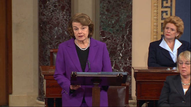 This frame grab from video, provided by Senate Television, shows Senate Intelligence Committee Chair Sen. Dianne Feinstein, D-Calif. speaking on the floor of the Senate on Capitol Hill in Washington, Tuesday, Dec. 9, 2014. Senate investigators have delivered a damning indictment of CIA interrogation practices after the 9/11 attacks, accusing the agency of inflicting pain and suffering on prisoners with tactics that went well beyond legal limits. The torture report released Tuesday by the Senate Intelligence Committee says the CIA deceived the nation with its insistence that the harsh interrogation tactics had saved lives. It says those claims are unsubstantiated by the CIA's own records. Sen. Debbie Stabenow, D-Mich. is at center, Sen. Patty Murray, D-Wash. is at right.  (AP Photo/Senate Television)