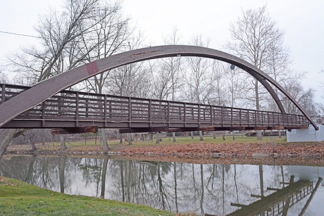 Various rotted areas on the arched pedestrian bridge across the River Raisin in Blissfield are to be repaired next year, and the entire structure is to be painted and sealed.