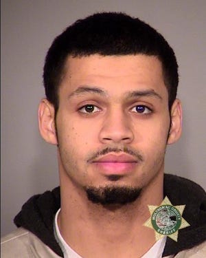 This photo provided by Multnomah County Sheriffís Office shows Lonzo Murphy. Portland police have arrested Murphy in connection with a shooting outside an alternative high school. Police said Saturday, Dec. 13, 2014, that Murphy, 22, was taken into custody overnight on a parole violation and additional charges are pending. Three students were wounded in the shooting Friday at a street corner near Rosemary Anderson High School. Police say the assailant and two other people fled, and the injured trio went to the school for help. (AP Photo/Multnomah County Sheriffís Office)