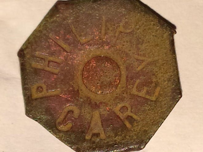 This is a shingles pin manufactured by the Philip Carey Company that made roofing materials in the 1930s.
