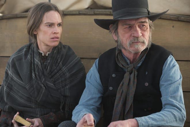 Hilary Swank and Tommy Lee Jones star in "The Homesman."