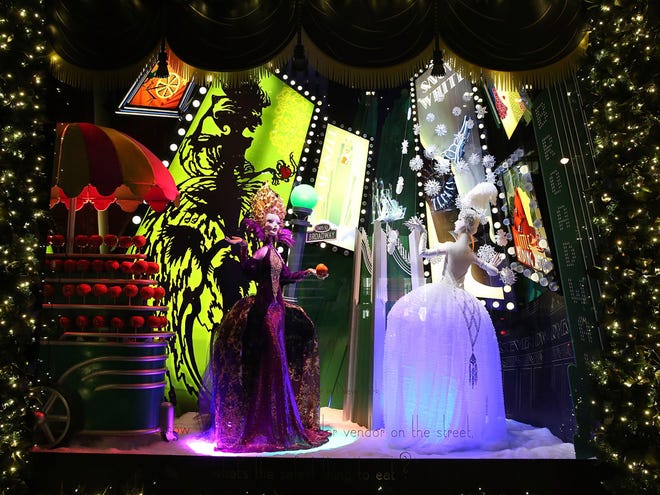 Saks Fifth Avenue shows one of the holiday windows at the retailer's flagship store in New York City. Saks' window displays this season are themed on classic fairytales but are decorated in Art Deco style.