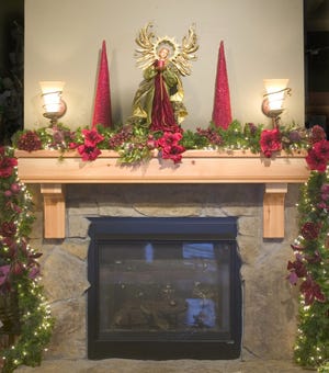 Your mantel should communicate one focused look, not a hodgepodge of different themes.