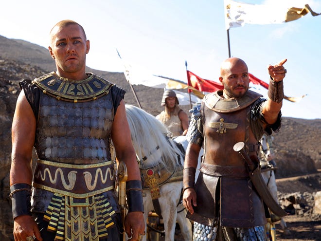 Joel Edgerton, left, and Dar Salim appear in a scene from "Exodus: Gods and Kings."