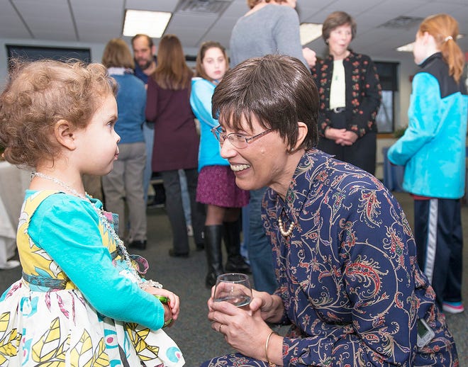 Cleo Warner, 3, thanks retiring Children's Librarian Phyllis Danko Saturday during a reception at Wiggin Memorial Library.

Photo by Amy Donle