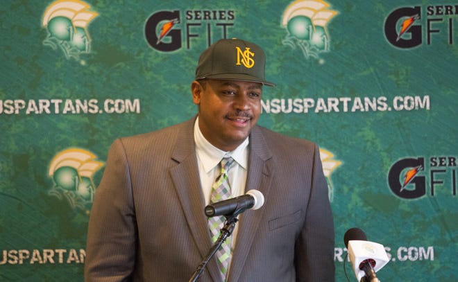 Latrell Scott speaks at a news conference Tuesday after being introduced as the new football coach at Norfolk State. Bill Tiernan/The Virginian-Pilot via AP Photo