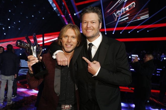 Craig Wayne Boyd, left, the country rocker from Blake Shelton's team, was named the winner of “The Voice” Tuesday.