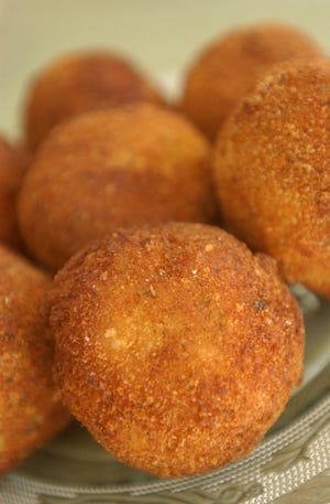 Frying a batter made from potatoes can take many forms, such as potato balls.