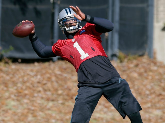 Carolina quarterback Cam Newton prepares to throw a pass during practice in Charlotte, N.C., Wednesday.
