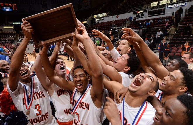 Chicago Whitney Young defeats Lisle Benet Academy 46-44 to claim the IHSA Class 4A championship title last March at the Peoria Civic Center.
