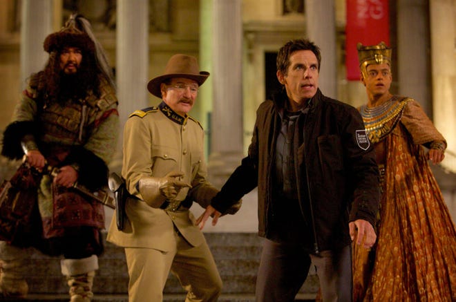 Reacting to an unexpected turn of events, from left, Attila the Hun (Patrick Gallagher), Teddy Roosevelt (Robin Williams), Larry Daley (Ben Stiller) and Ahkmenrah (Rami Malek). The film, the third in the series, is set in London.