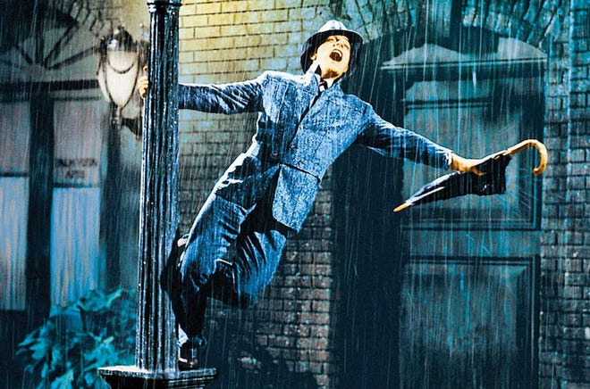 "Singin' in the Rain," the 1952 movie musical starring Gene Kelley, pictured, Donald O'Connor and Debbie Reynolds, will be shown along with "Meet Me in St. Louis" at a famlily film double-feature at 7 p.m. Saturday at the Auburn Community Center, 121 W. 11th.