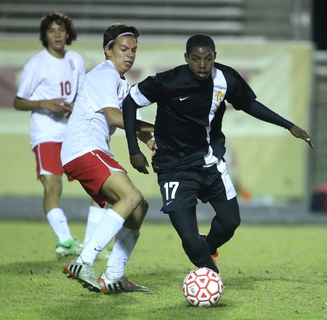 Rutherford's Quentin Reese (17) scored three goals, including two in the first half, against Bay.