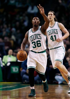 Marcus Smart (36) figures to have a bigger opportunity with Rajon Rondo traded. AP PHOTO/CHARLES KRUPA