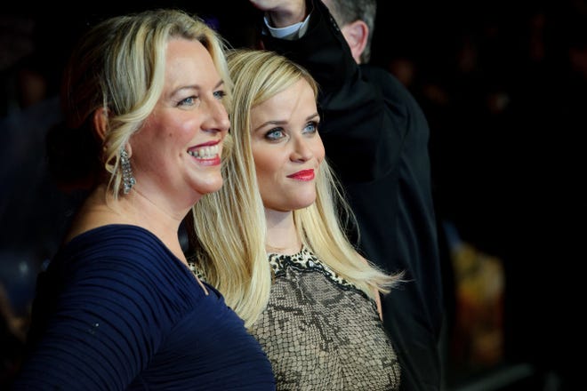 Author Cheryl Strayed, left, is portrayed by actress Reese Witherspoon in the film version of her memoir, "Wild."