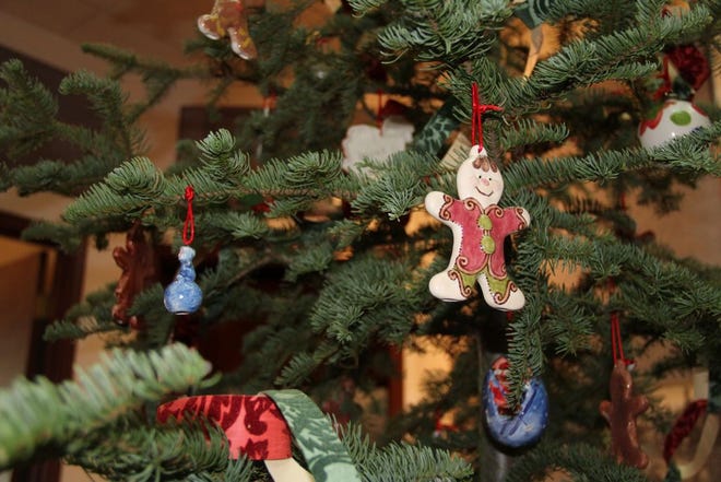 Hand-decorated ornaments deck the museum's Christmas tree.