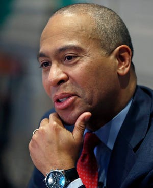 Massachusetts Gov. Deval Patrick speaks during an interview at his Statehouse office in Boston, Monday, Dec. 15, 2014. Patrick says he still has made no decisions about his future after leaving office. His final day as governor is Jan. 8. (AP Photo/Elise Amendola)